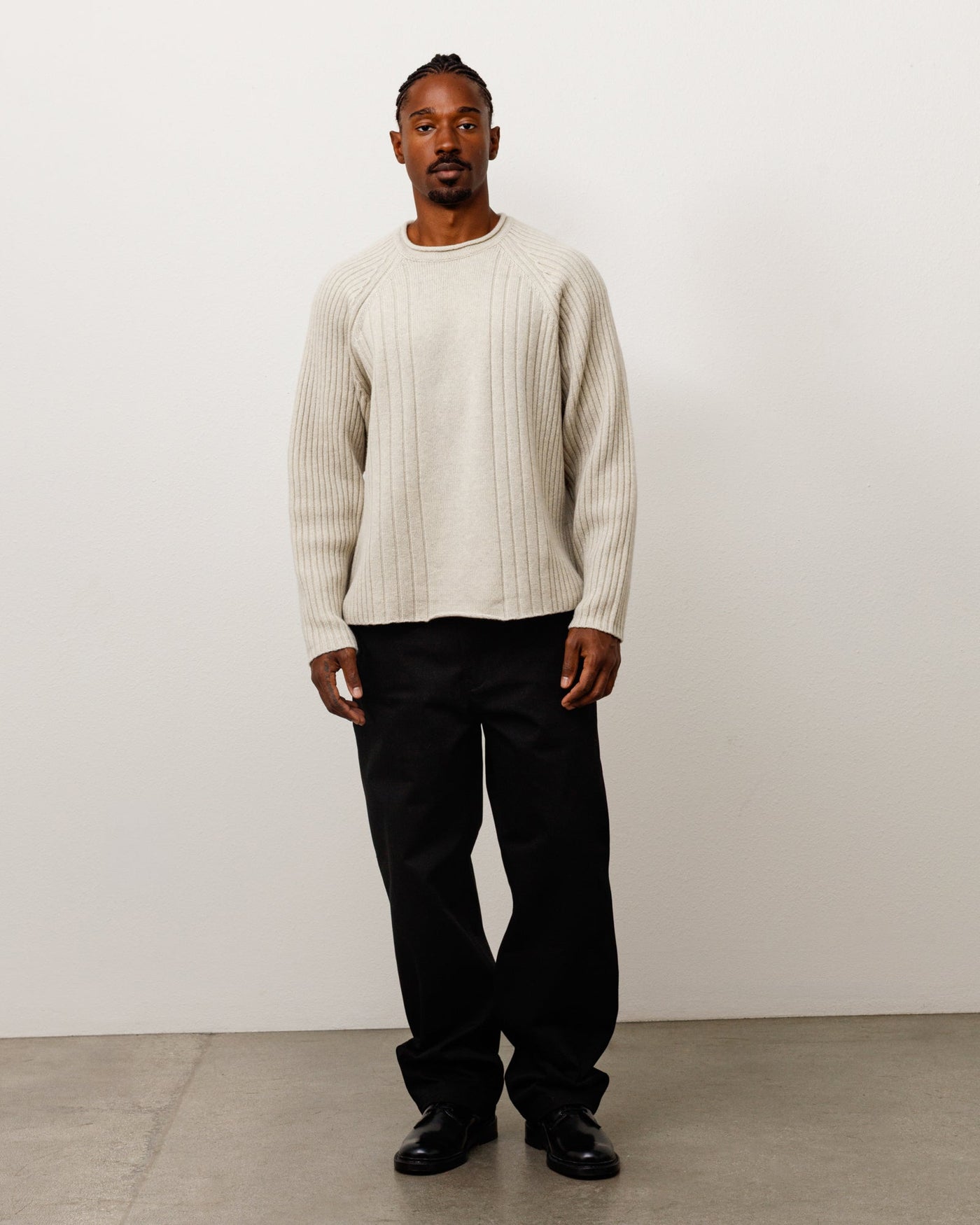 MERINO ROLL NECK SWEATER